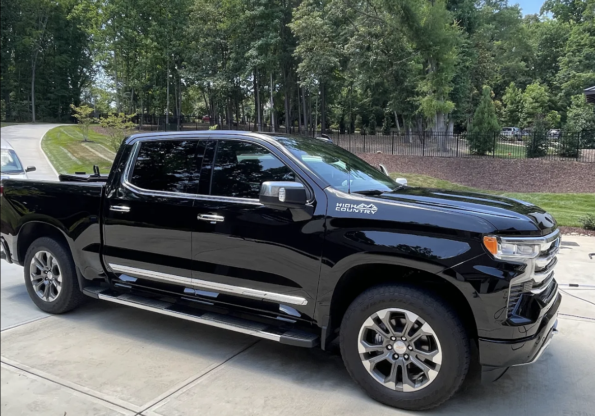 Glossy black Chevrolet High Country truck showcasing professional Car Detailing in Lake Norman.